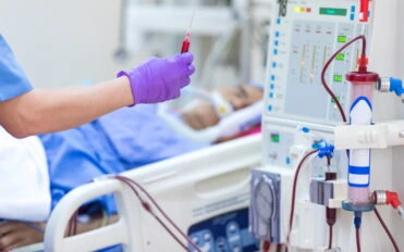 The specialist are doing continuous renal replacement therapy equipment and injection pump.